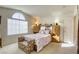 Bright bedroom with a queen-size bed and built-in wooden cabinets at 10016 Diving Duck Ave, Las Vegas, NV 89117