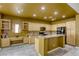 Bright kitchen with ample cabinetry and granite countertops at 10016 Diving Duck Ave, Las Vegas, NV 89117