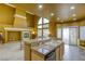 Island kitchen with granite countertops and high ceilings at 10016 Diving Duck Ave, Las Vegas, NV 89117