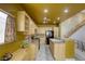 Well-equipped kitchen with granite countertops and island at 10016 Diving Duck Ave, Las Vegas, NV 89117