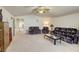 Spacious recreation room with couches and access to another room at 10016 Diving Duck Ave, Las Vegas, NV 89117