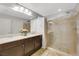 Double vanity bathroom with a large walk-in shower at 10166 Bishops Peak Ct, Las Vegas, NV 89141