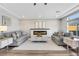 Spacious living room featuring a modern fireplace and comfortable seating at 10166 Bishops Peak Ct, Las Vegas, NV 89141