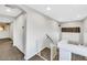 Upstairs hallway with a safety gate and carpet at 10166 Bishops Peak Ct, Las Vegas, NV 89141