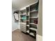 Well-organized walk-in closet with custom shelving and drawers at 10166 Bishops Peak Ct, Las Vegas, NV 89141