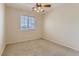 Bright bedroom with ceiling fan and window coverings at 10489 Bolting Cloud Dr, Las Vegas, NV 89178