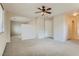 Bedroom with window, ceiling fan and room divider at 10489 Bolting Cloud Dr, Las Vegas, NV 89178