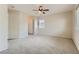 Well lit bedroom with ceiling fan and carpet flooring at 10489 Bolting Cloud Dr, Las Vegas, NV 89178