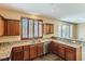 Kitchen with granite countertops and wood cabinets at 10489 Bolting Cloud Dr, Las Vegas, NV 89178