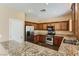 Kitchen with granite countertops and stainless steel appliances at 10489 Bolting Cloud Dr, Las Vegas, NV 89178