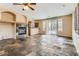 Living room with fireplace and slate tile flooring at 10489 Bolting Cloud Dr, Las Vegas, NV 89178