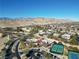 Aerial view of community amenities including pool, tennis courts, and residential homes at 11280 Granite Ridge Dr # 1032, Las Vegas, NV 89135