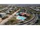 Aerial view of community pool, tennis courts, and neighborhood at 11280 Granite Ridge Dr # 1032, Las Vegas, NV 89135