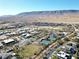 Aerial view of community and surrounding landscape, including tennis courts at 11280 Granite Ridge Dr # 1032, Las Vegas, NV 89135