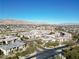 Aerial view of community, showcasing various homes and mountain views at 11280 Granite Ridge Dr # 1032, Las Vegas, NV 89135