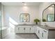 Double vanity bathroom with gray countertops and white cabinets at 11280 Granite Ridge Dr # 1032, Las Vegas, NV 89135