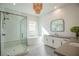 Modern bathroom with soaking tub, walk-in shower, and dual vanities at 11280 Granite Ridge Dr # 1032, Las Vegas, NV 89135