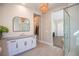 Bathroom with double vanity, walk in shower, and view to bedroom at 11280 Granite Ridge Dr # 1032, Las Vegas, NV 89135