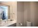 Modern bathroom with white vanity and toilet at 11280 Granite Ridge Dr # 1032, Las Vegas, NV 89135