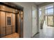 Modern elevator and staircase in entryway at 11280 Granite Ridge Dr # 1032, Las Vegas, NV 89135