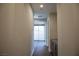 Bright hallway with wood floors and access to balcony at 11280 Granite Ridge Dr # 1032, Las Vegas, NV 89135