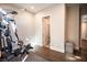 Home gym with weight machine and adjacent bathroom access at 11280 Granite Ridge Dr # 1032, Las Vegas, NV 89135