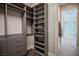 Well-organized walk-in closet with shelves and drawers at 11280 Granite Ridge Dr # 1032, Las Vegas, NV 89135