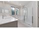 Main bathroom with soaking tub, walk-in shower, and double vanity at 11327 Gravitation Dr, Las Vegas, NV 89135