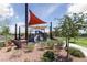 playground with shade structure and play equipment at 11327 Gravitation Dr, Las Vegas, NV 89135