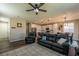 Open concept living room, kitchen, and dining area with hardwood floors at 126 Ostinato Ln, Henderson, NV 89015