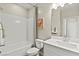 Clean bathroom with white vanity, subway tile, and bathtub at 127 Harmonica Ave # Lot 14, Henderson, NV 89011