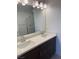 Modern bathroom with double vanity and large mirror at 127 Harmonica Ave # Lot 14, Henderson, NV 89011