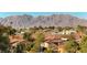 Aerial view showcasing the neighborhood and mountain backdrop at 1426 Radig Ct, Boulder City, NV 89005