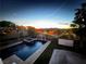 Stunning sunset view from backyard with pool and spa at 1426 Radig Ct, Boulder City, NV 89005