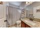 Bathroom with shower/tub combo and granite vanity at 1426 Radig Ct, Boulder City, NV 89005