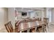 Farmhouse style dining area with rustic wood table and metal chairs at 1426 Radig Ct, Boulder City, NV 89005