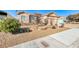 Two-story house with front yard landscaping and a two-car garage at 1426 Radig Ct, Boulder City, NV 89005