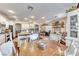 Open concept kitchen with island, dining area, and hardwood floors at 1426 Radig Ct, Boulder City, NV 89005