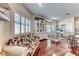 Comfortable living area with hardwood floors and a cowhide couch at 1426 Radig Ct, Boulder City, NV 89005