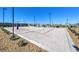 Well-lit outdoor sand volleyball court with a net at 1598 Dom River Dr # Lot 137, North Las Vegas, NV 89084