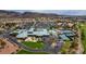 Community clubhouse with pool and tennis courts at 1848 Mountain Ranch Ave, Henderson, NV 89012