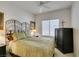 Bright bedroom with a comfortable bed and decorative headboard at 1848 Mountain Ranch Ave Dr, Henderson, NV 89012