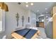 Bright dining area with a table and chairs near the kitchen at 1848 Mountain Ranch Ave Dr, Henderson, NV 89012