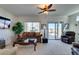 Spacious living room with lots of natural light, comfortable furniture, and a view at 1848 Mountain Ranch Ave Dr, Henderson, NV 89012