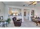 Living room with open concept and partial kitchen view at 1848 Mountain Ranch Ave Dr, Henderson, NV 89012