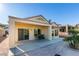 Covered patio with seating area, perfect for outdoor dining at 1848 Mountain Ranch Ave, Henderson, NV 89012