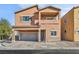 Two-story house with attached garage and front yard landscaping at 1992 Star Creek Bay Ln, Las Vegas, NV 89115