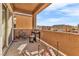 Private balcony with table, chairs, and a view of the community at 1992 Star Creek Bay Ln, Las Vegas, NV 89115