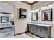 Double vanity bathroom with granite countertops at 2051 Saginaw Ave, Pahrump, NV 89048