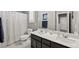 Bathroom with double sinks, shower, and toilet at 2365 Boretto St, Henderson, NV 89044